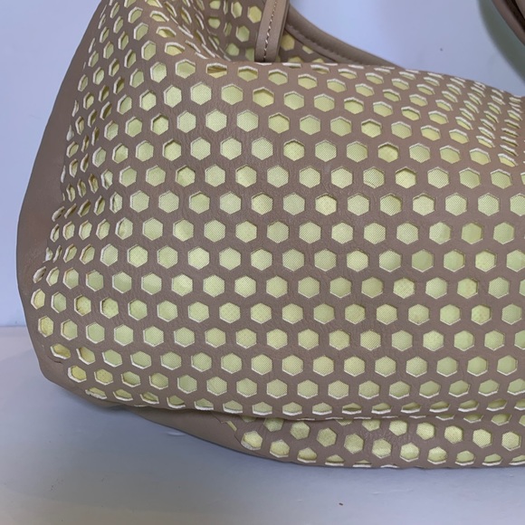 Charming Charlie Tan and Yellow Buttercup perforated Hobo Handbag - Picture 2 of 10